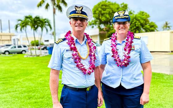 Photo Of Capt. Jessica Worst and Capt. Robert Kistner stand for a photo at U.S. Coast Guard Forces Micronesia/Sector Guam following a change of command ceremony in Santa Rita, Guam, on Oct. 4, 2024.