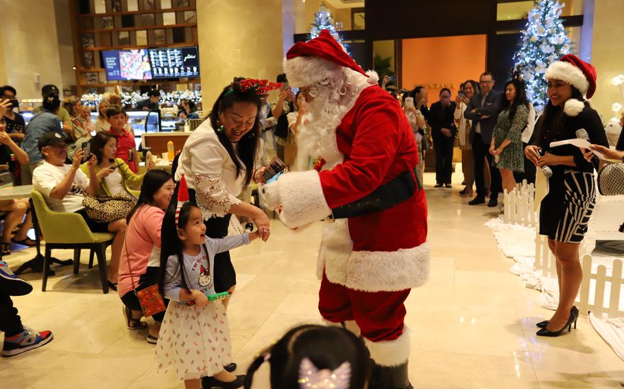 Photo from left to right: Alyssa Ng, Angela Ng, Santa Claus, Marissa Borja