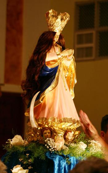 A procession is held to honor Santa Marian Kamalen on the Feast of the Immaculate Conception.