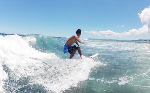 Photo Of Let's catch a wave! Surf's up off Guam's beautiful shores!