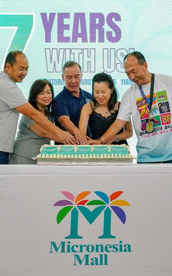 Congressman James Moylan and Goodwind Development Corporation executives cut a surprise cake for Micronesia Mall’s 37th Anniversary.
